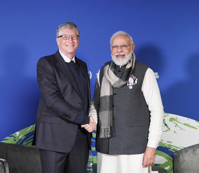 PM Narendra Modi with Bill Gates in Glasgow, Scotland, on Tuesday. PTI