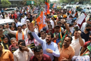 BJP supporters protest outside residence of Delhi CM Arvind Kejriwal.